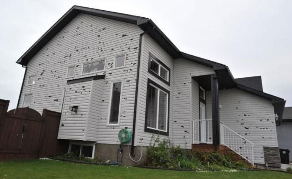 Hail Damaged House